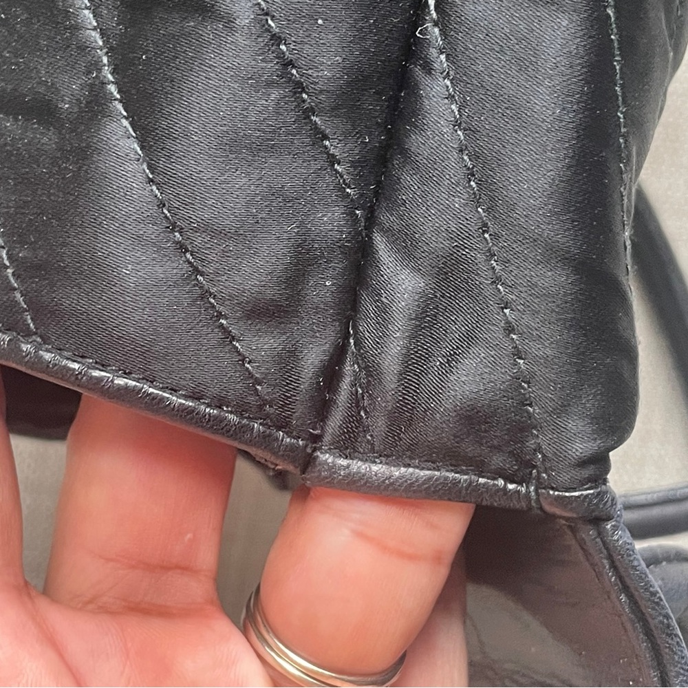 CHANEL Black Quilted Crossbody Bag with Pearl Flower Medallion - Picture 7 of 13